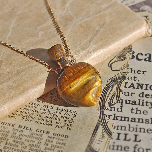 Collar Botella Mágica – Ojo de Tigre & Acero Inox. Dorado