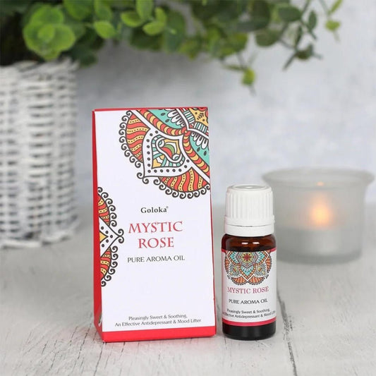 Esencia de rosa mística Goloka en frasco, aroma floral suave y delicado, ideal para aromaterapia y uso espiritual.