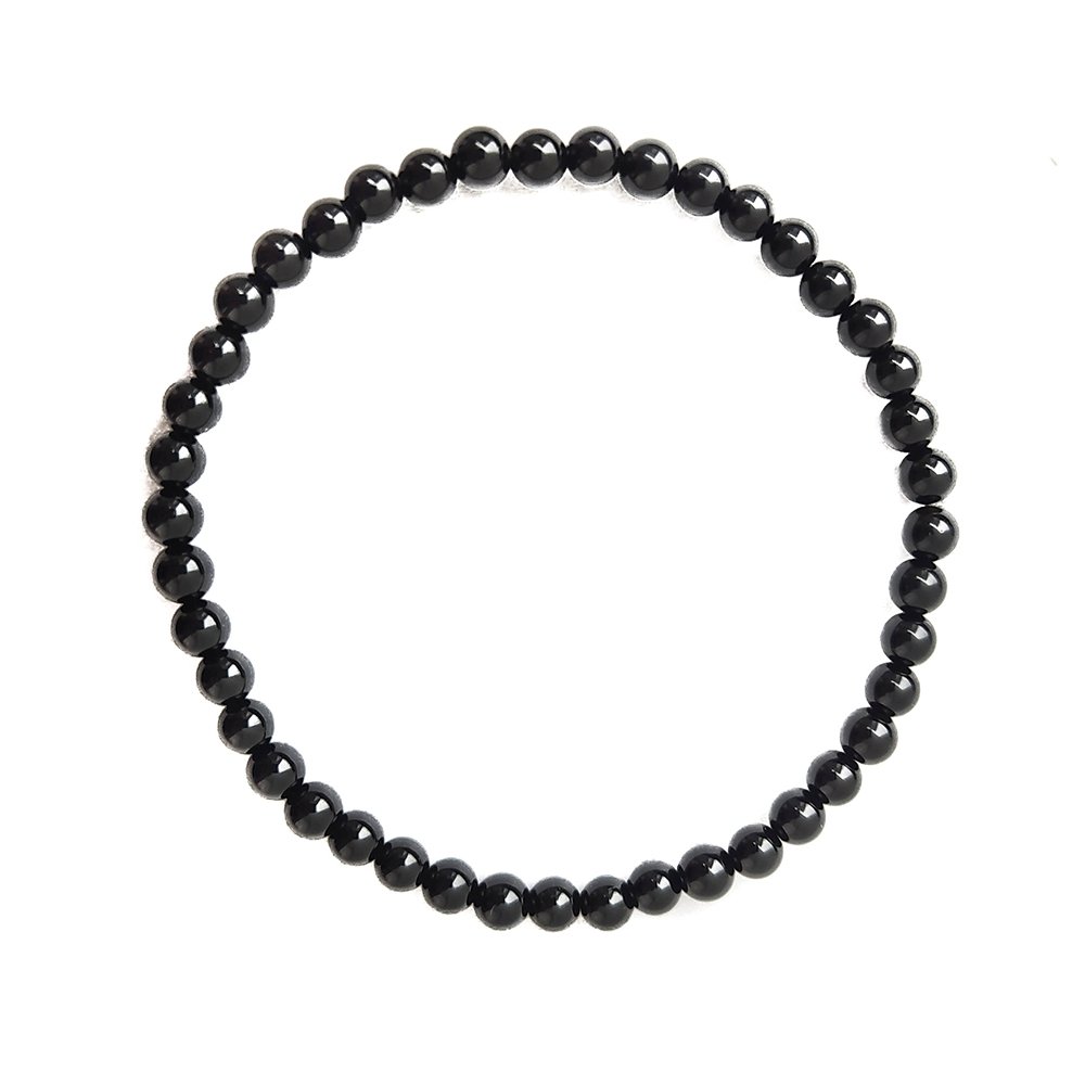 Pulsera de mineral Ágata Negra de Mystical Tienda, con cuentas redondas y acabado brillante, en vista frontal.