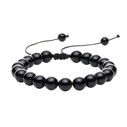 Pulsera de mineral ónix con nudo corredizo de estilo artesanal, diseñada por Mystical Tienda.