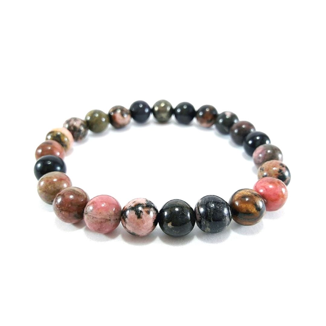 Pulsera de mineral de rodonita con bolas lisas, joya de estilo natural y elegante, mostrada en la imagen.