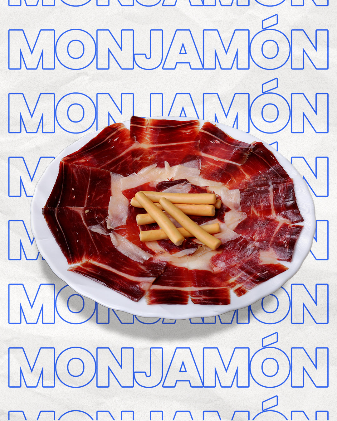 Jamón Gran Reserva de 80g de MONJAMON Y MAS, cortado a cuchillo, con lonchas finas y color rubí intenso.