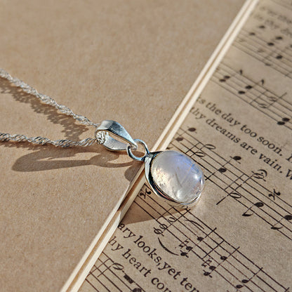 Colgante de piedra de luna y plata de ley 925, diseño con piedra brillante y detalles elegantes, joya de plata para mujer.