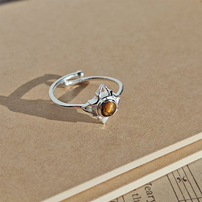 Anillo Nudo de Bruja Wicca con Ojo de Tigre en plata de ley 925, diseño místico y elegante, para amantes de la joyería espiritual.