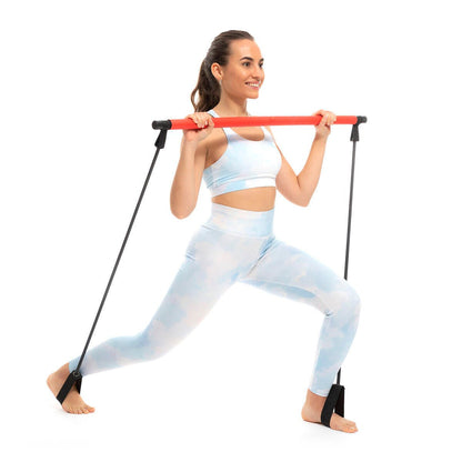 Barra de fitness con bandas elásticas y guía de ejercicios de Innovagizmo, ideal para entrenamiento en casa o en el gimnasio.