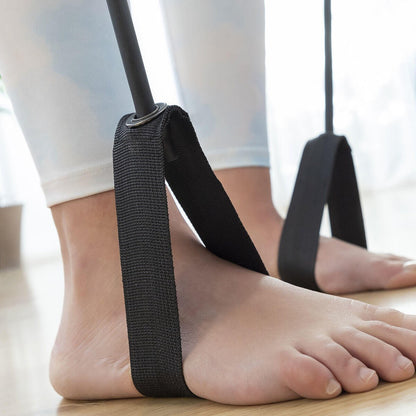 Barra de fitness con bandas elásticas y guía de ejercicios Resibar de Innovagizmo, ideal para entrenamiento en casa.