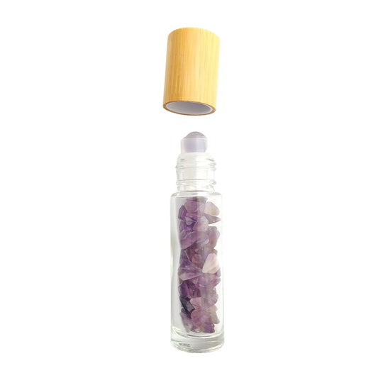 Botella roll-on de amatista de cristal, con chip para aromaterapia, en envase transparente de Mystical Tienda.