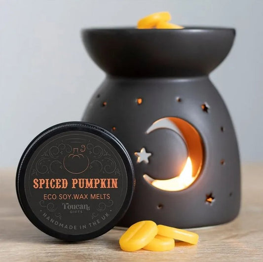 Velas de cera con forma de calabaza especiada, aroma cálido y aromático, ideal para ambientar con la marca Mystical Tienda.