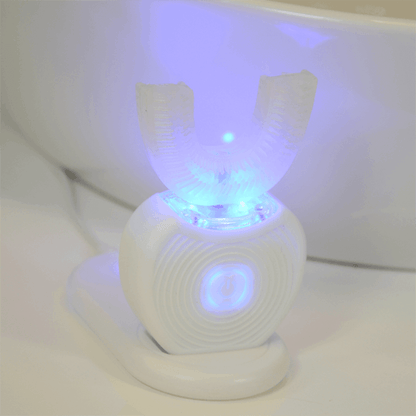 Cepillo dental automático 360º de innovagizmo, higiene rápida y sonrisa perfecta en solo 10 segundos, con diseño moderno y compacto.