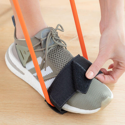 Cinturón con bandas de resistencia para glúteos y guía de ejercicios Bootrainer Innovagoods, en color negro con bandas elásticas.