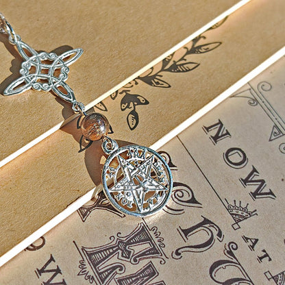 Colgante de plata Nudo de Bruja y Tetragramaton con bola de Ojo de Tigre, estilo místico, en acabado S925.