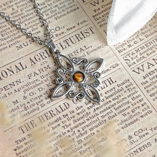 Collar Nudo de Bruja Acero Inox. con Ojo de Tigre