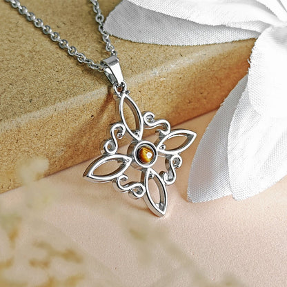 Collar Nudo de Bruja Acero Inox. con Ojo de Tigre