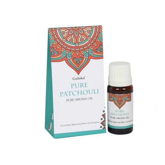 Esencia de pachulí Goloka en frasco, aroma natural y aromático, para uso en aromaterapia y relajación.