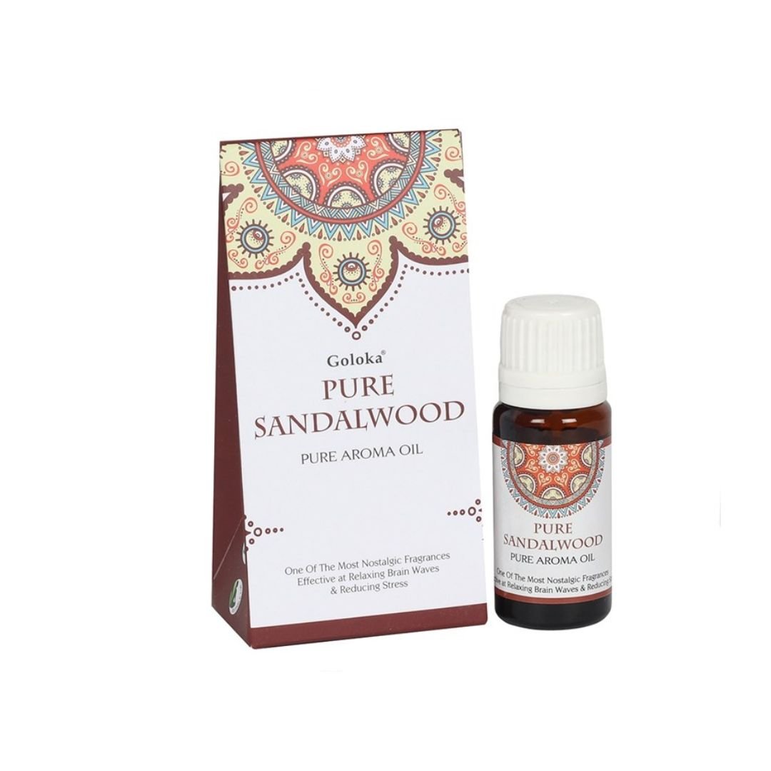 Esencia de sándalo Goloka en frasco de cristal, aroma relajante y natural para aromaterapia, de la marca Mystical Tienda.
