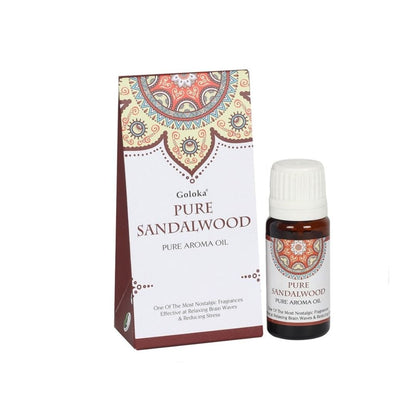 Esencia de sándalo Goloka en frasco de cristal, aroma relajante y natural para aromaterapia, de la marca Mystical Tienda.