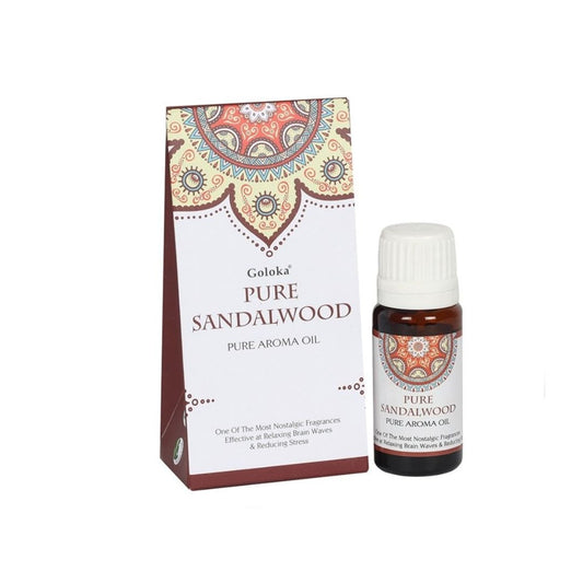Esencia de sándalo Goloka en frasco de cristal, aroma relajante y natural para aromaterapia, de la marca Mystical Tienda.