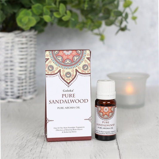 Esencia de sándalo Goloka en frasco, aroma relajante y natural, para aromaterapia y ambientación en casa.