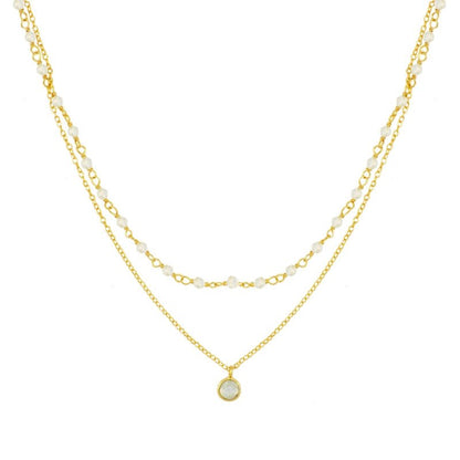 Gargantilla 'Sophia' de piedra de luna de Mystical Tienda, con cadena delicada y piedra brillante, en un fondo neutro.