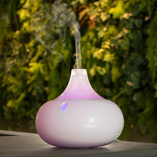 Humidificador difusor de aromas innovagizmo WT-203 con diseño compacto y vaporizador en funcionamiento.