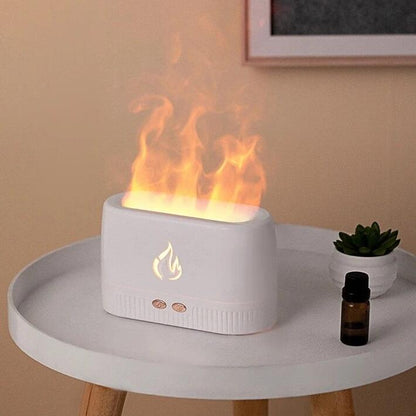 Humidificador efecto llamas innovagizmo con diseño que simula llamas y vapor de agua en la parte superior.