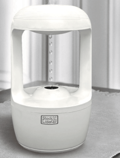 Humidificador gotas antigravedad de innovagizmo, con diseño innovador y gotas que caen en un ambiente de hogar o oficina.