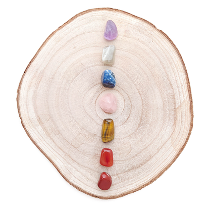 Kit de los Siete Chakras con cristales de cuarzo rosa y piedra de luna, incluye siete piezas para equilibrio espiritual.