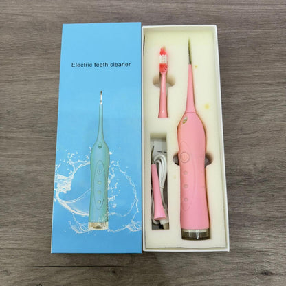 Limpiador de dientes ultrasónico Innovagizmo en uso, mostrando cabezal de limpieza y mango ergonómico para higiene bucal efectiva.