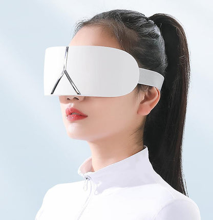 Masajeador de ojos innovagizmo.com, dispositivo portátil para aliviar ojeras y fatiga visual, con superficie suave y ergonómica.