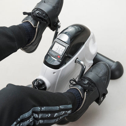 Pedaleador para brazos y piernas Fipex InnovaGoods, equipo de ejercicio portátil y compacto para entrenamiento en casa.