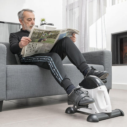 Pedaleador para brazos y piernas Fipex InnovaGoods, con manijas antideslizantes y pantalla digital para monitorear el ejercicio.