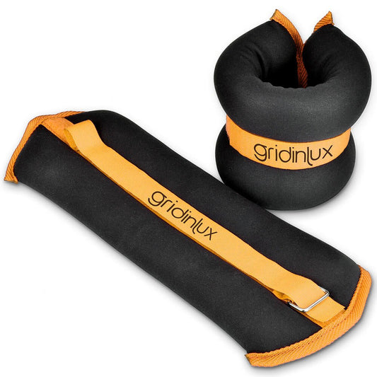 Pesas lastradas de 4kg para tobillo y muñeca de innovagizmo, con correa ajustable y diseño resistente.