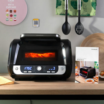 Freidora de aire con grill Fryinn 12-en-1 en negro, accesorios y recetario, 6000 W, capacidad de 6 litros, acero inoxidable.