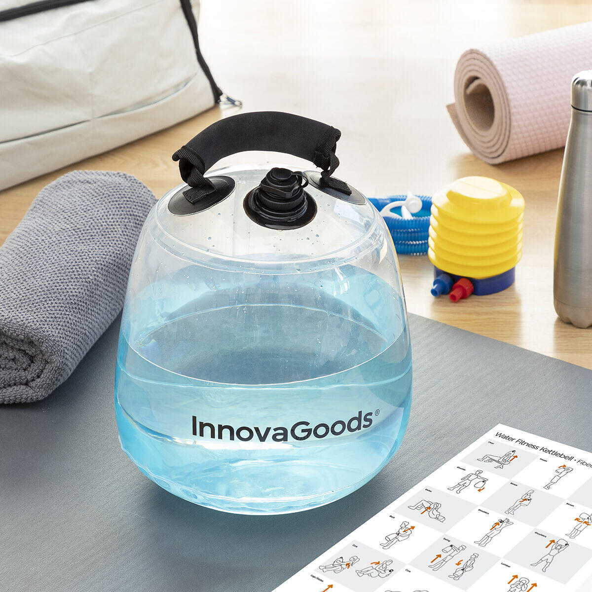 Pesa rusa de agua Fibell para entrenamiento fitness, con guía de ejercicios, en color azul y diseño ergonómico.