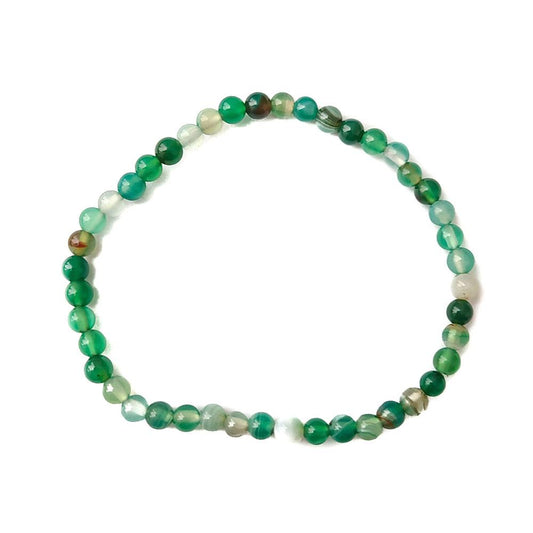 Pulsera de mineral Agata Verde con bolas lisas, accesorio de joyería natural y elegante en tonos verdes.