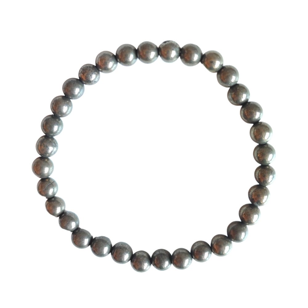 Pulsera de mineral con bolas lisas de pirita para atraer abundancia, diseñada por Mystical Tienda.