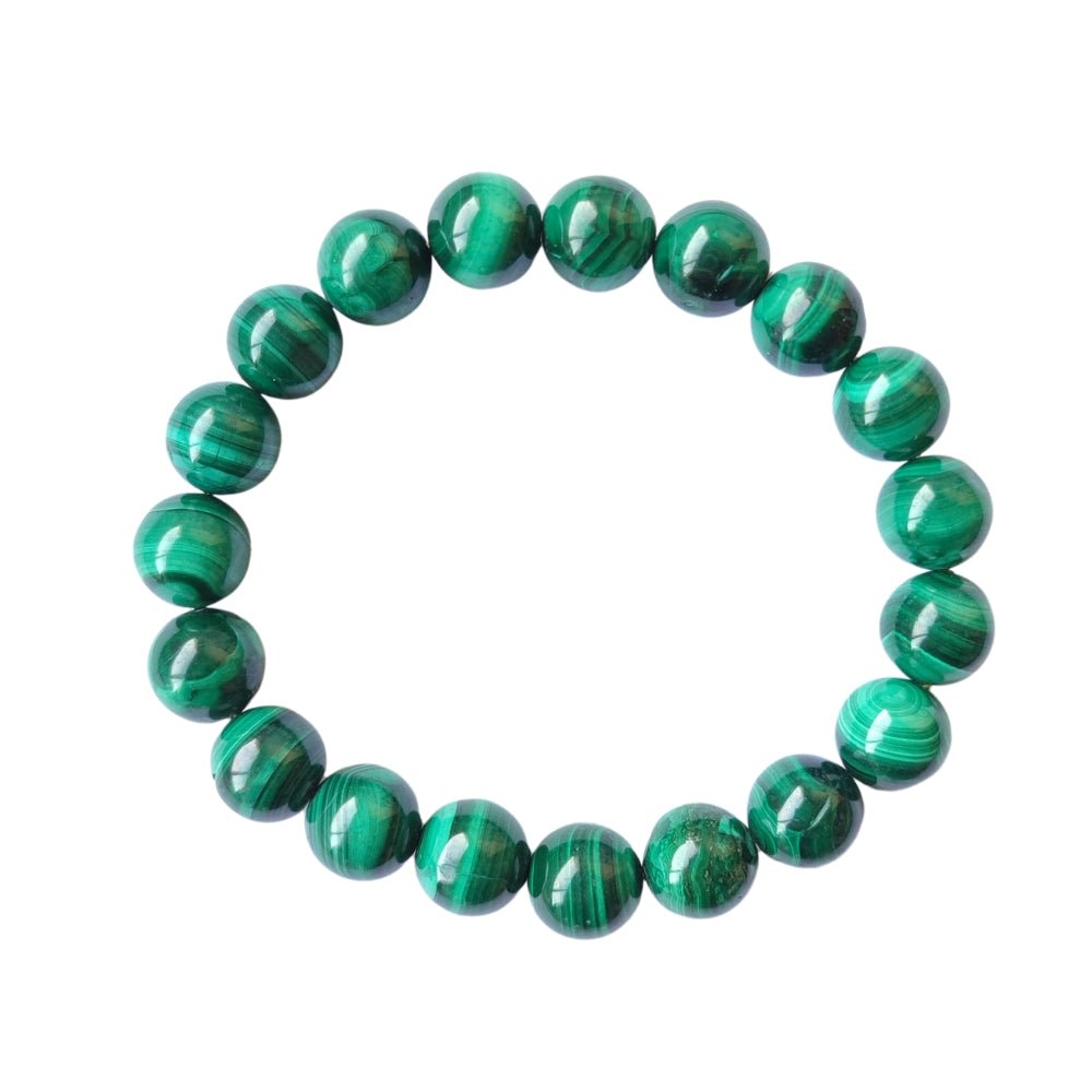 Pulsera de malaquita con bolas lisas, mineral de color verde intenso, diseñada por Mystical Tienda.