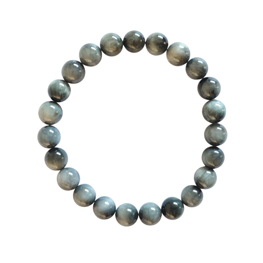 Pulsera de mineral Ojo de Gato en bola lisa, joya elegante de Mystical Tienda, con cuentas redondas y brillante acabado natural.