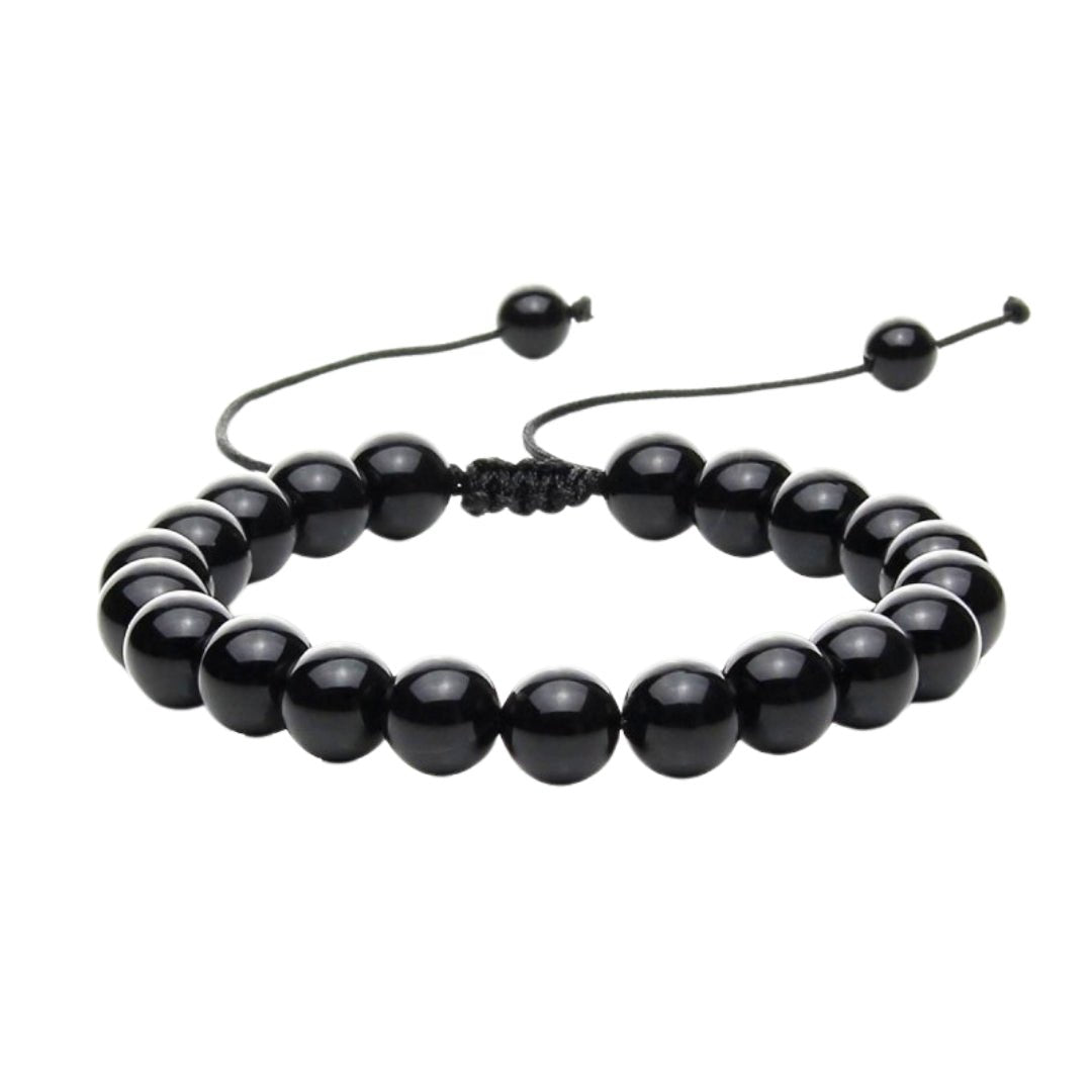 Pulsera de mineral ónix con nudo corredizo de estilo artesanal, diseñada por Mystical Tienda.