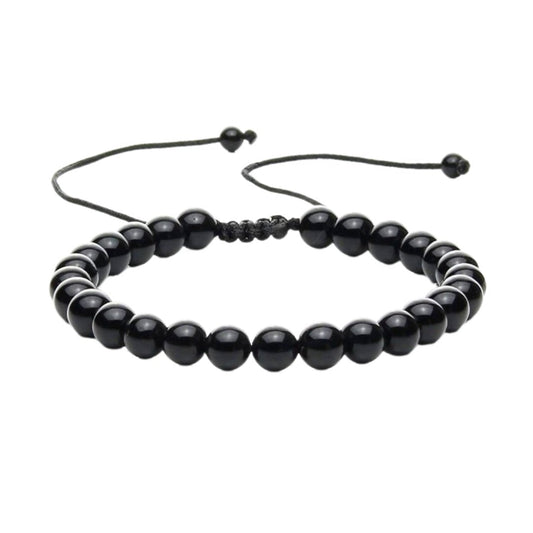 Pulsera de mineral ónix con nudo corredizo, accesorio elegante y natural, ideal para complementar estilos bohemios y modernos.