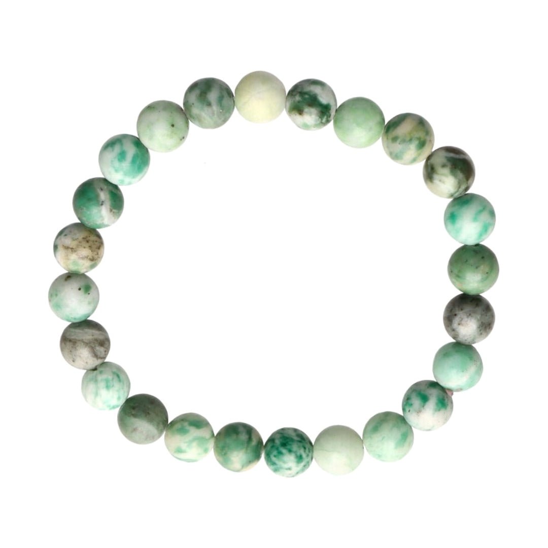 Pulsera de serpentina de mineral de estilo natural, con detalles en tonos verdes y morados, de la marca Mystical Tienda.