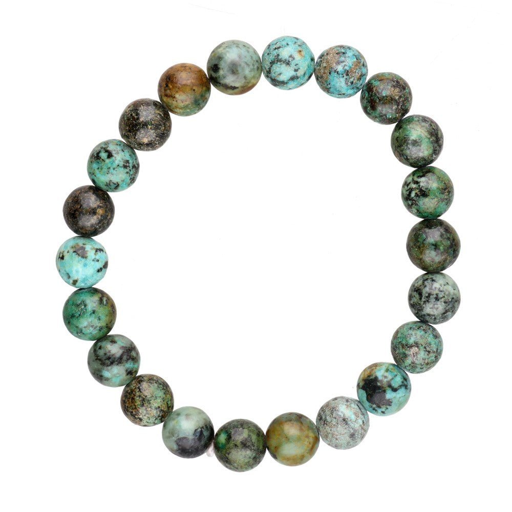 Pulsera de mineral de turquesa africana con cuentas azules y detalles naturales, ideal para accesorios de estilo bohemio.