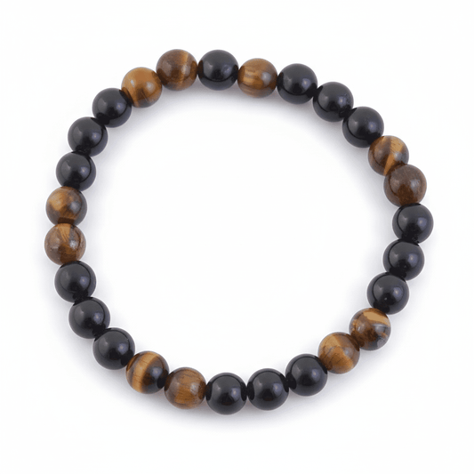 Pulsera de mineral “Limpieza Energética” con ojo de tigre y turmalina, diseñada para equilibrar y proteger la energía.