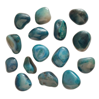 Rodado de ágata azul de Mystical Tienda, muestra detalles y vetas en piedra natural para uso decorativo o energético.