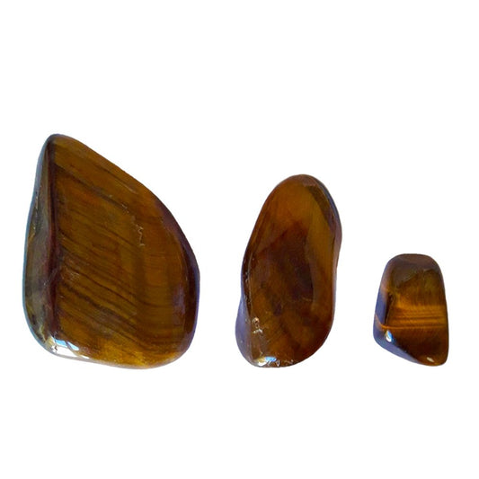 Rodado de Ojo de Tigre de la marca Mystical Tienda, piedra de cristal con patrones dorados y marrones, vista detallada sobre fondo neutro.