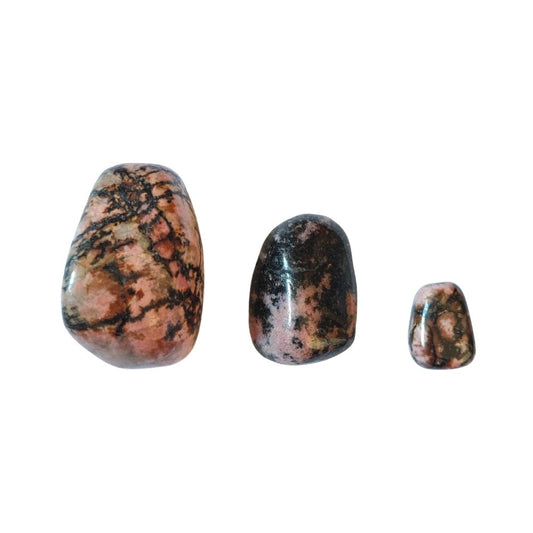 Rodado de rodonita de Mystical Tienda, piedra lisa y pulida de color rosa con vetas negras, ideal para decoración y energías positivas.