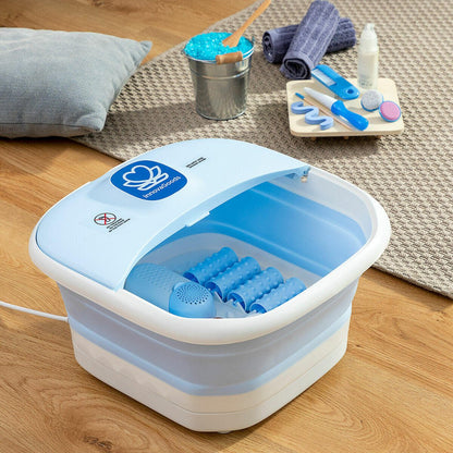Spa para pies plegable Footopy InnovaGoods con rodillos e hidromasaje, visible en el interior con agua y masajeador en el pie.
