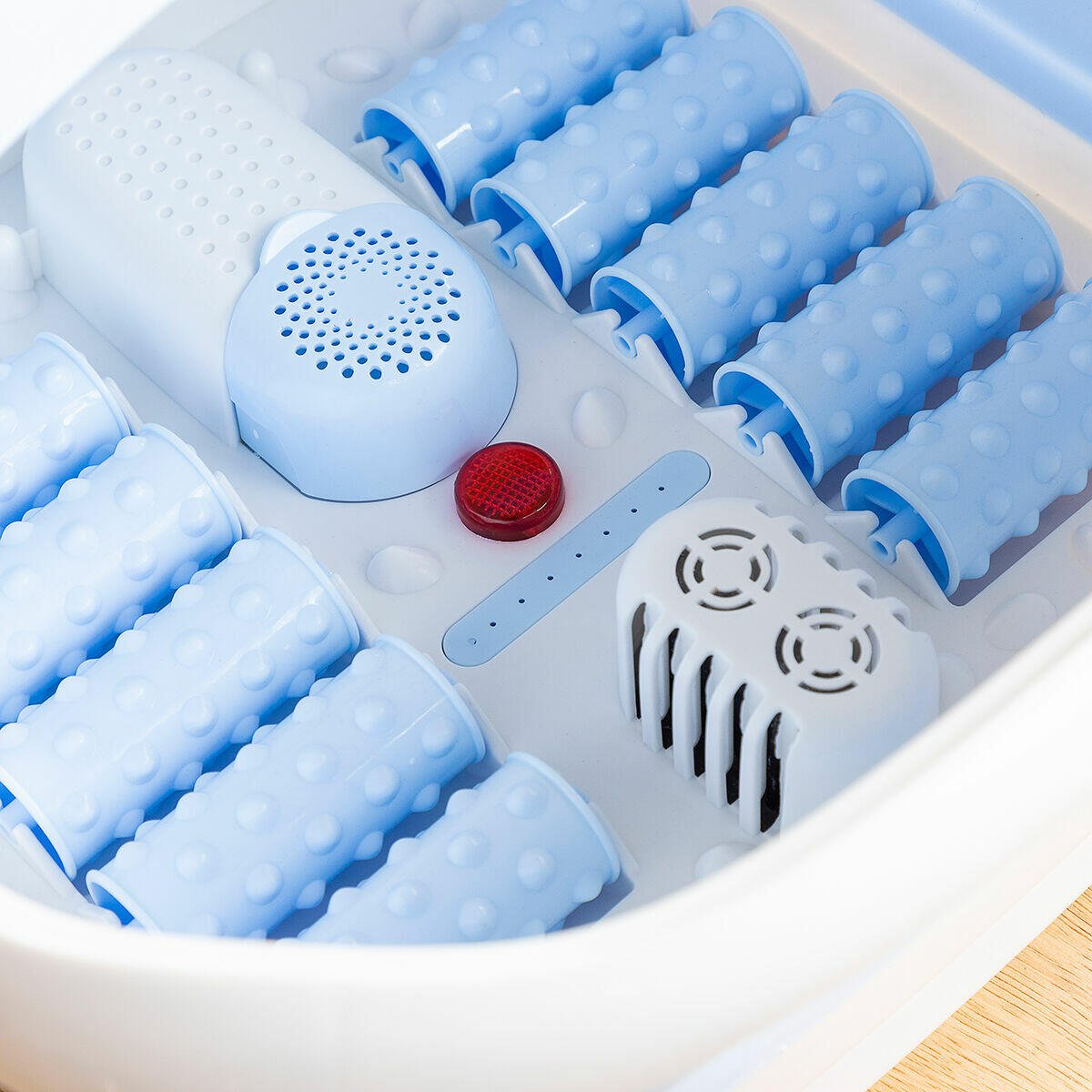 Spa para pies plegable con rodillos e hidromasaje Footopy InnovaGoods, ideal para relajar y masajear los pies en casa.